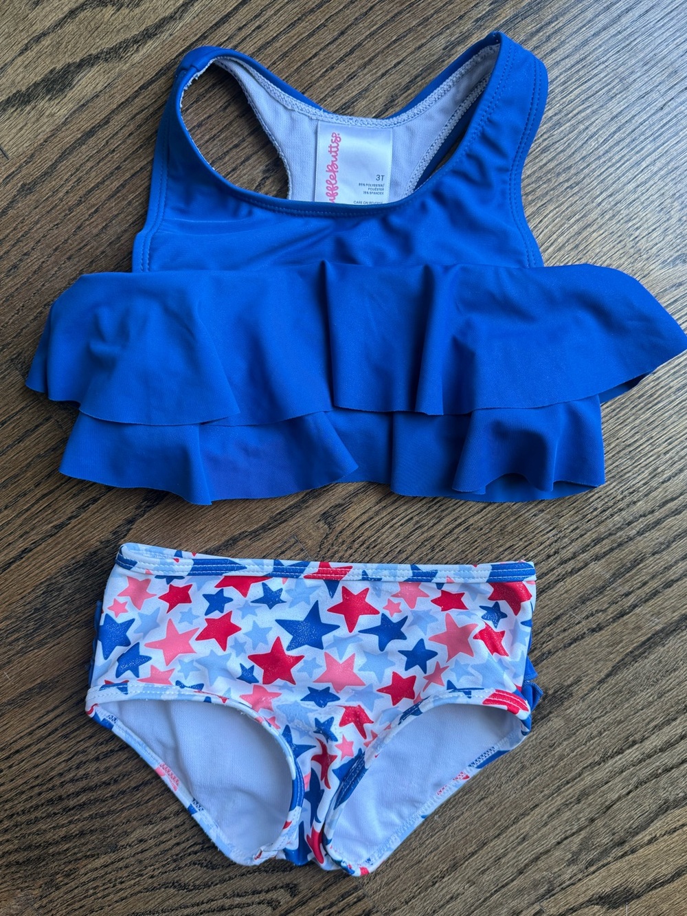 Rufflebutts Tankini Top with Red, White & Blue Star Bottoms